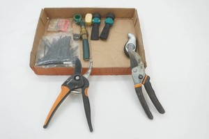 2 Fiskars scissors, mini zip ties, hose ends, gaskets, hose repair parts