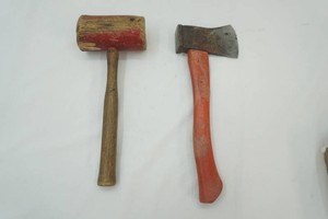 vintage wood mallet and steel hatchet head with composite handle