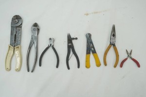 variety of pliers, needle nose, wire cutterstripper, snap ring plier, Nocking plier