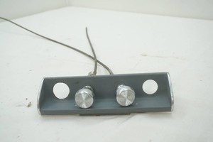 4 hole bracket with 2 control cables attached
