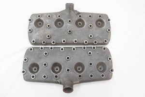 2 vintage Ford Flat head V-8 cylinder has stamped #99T6049 and #99t6050