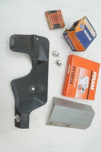 distributor cap, tail lamp lens, transmission filter kit, kick panel