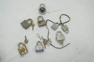 group of padlocks and keys