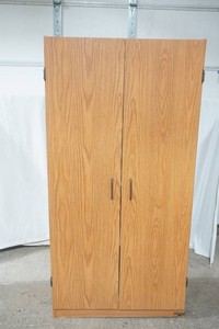 Sauder pressed wood cabinet with 2 doors and 3 shelves, 2 are adjustable 16 x 30 x 60