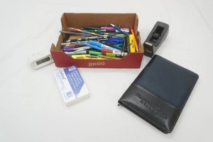 Journal, tape dispenser, index cards, clock, pens, pencils, markers, scissors