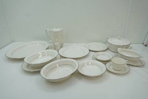 Noritake Ivory China in the Marseille pattern#7550 with 2 serving platters, round covered bowl, gravy boat, salt and pepper set, 2 oval serving bowls, and table setting for 10 except only 8 cups