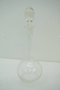 vintage clear glass wine decanter with matching tear drop shaped stopper