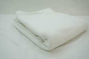 knit blanket 88 x 62 has some fading on one end