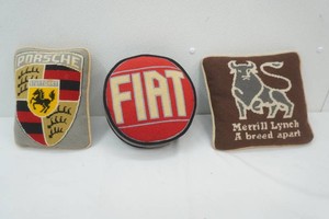 3 small accent pillows, Fiat, Porsche, Merrill Lynch