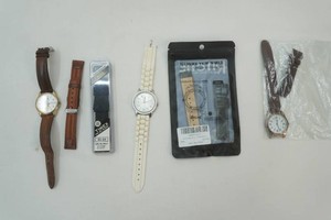 group of watches including Lorus with Mickey Mouse on face, Accutime Watch Co., and a variety of watch bands