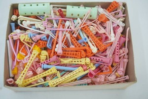 large group of vintage hair curlers