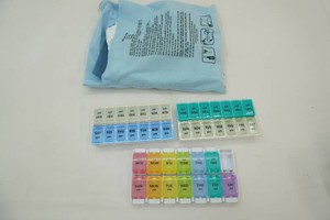 3 multi day pill containers, heating pad