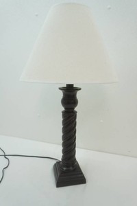wood table lamp with distinctive spiral-twisted column and white tapered shade