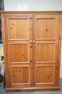 large pine cabinet with 2 doors that open to 4 adjustable shelves and 3 drawers, pull out keyboard tray 52 x 22 x 68