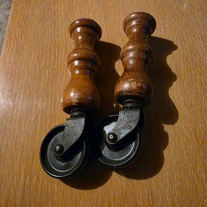 Pair of Turned Wood Furniture Legs with Metal Casters