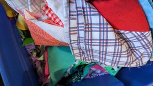 Assorted Quilting and Craft Fabric in Blue Storage Tote 