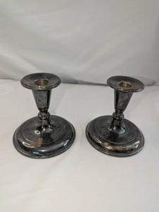 Pair of Silver-Plated Metal Candlesticks  Faber & Son Ltd.