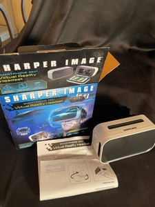 437 - Sharper Image Virtual Reality Headset with Box & Manual