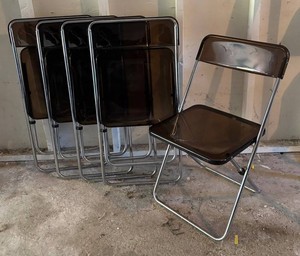 G - Set of Five Brown Translucent Chrome-Framed Folding Chairs