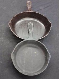 2 CAST IRON PANS