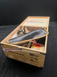 WOODEN AUDIOBAHN BOX FULL OF GUN ACCESSORIES