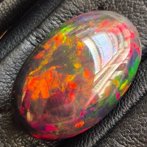 Natural Welo Black Opal with Exceptional Play-of-Color Carat Weight & Retail to Be Added