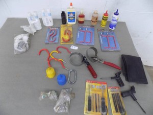 Shop Items   Tire repair items  Wall hooks  Filter wrenches  Small funnels  Glue  Marking chalk