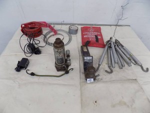 Lot of Miscellaneous Items   Hydraulic jack  Ridgid hitch  Fire blanket  Chargers  Turnbuckles  Red tape  Tote