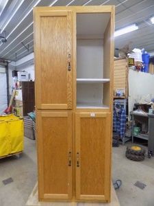 Storage Cabinet  Missing 1 Door   33 Wide  24 Deep  84 High.