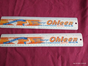 (2) Vintage Ohleen Milk Advertising Metal Rulers