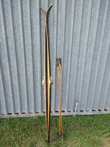 Vintage Skis With Poles and Ski Shoes