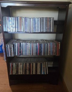 Wood CD Storage Rack Cabinet with Assorted Music CDs Dark Finish