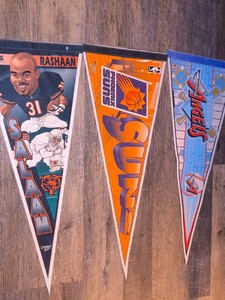 Variety of Vintage Sports Pennants featuring the Rashaan Salaam, Phoenix Suns, and Anaheim Angels