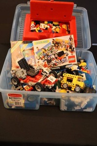 Assortment of LEGO Vehicles, Building Bricks & Instruction Booklets