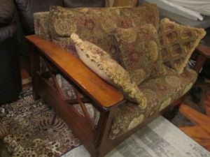 Wood frame love seat with comfy cushions