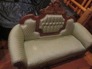 Ornate wood frame upholstered couch