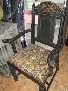 Ornate wood framed upholstered chair