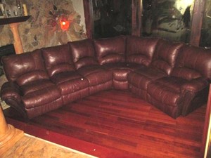 Sectional pleather sofa with reclining sections