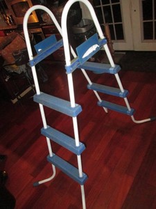 Double sided pool ladder
