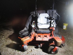 eXmark Zero turn lawn mower with a Kawasaki engine, 60 mower deck, runs and mows, bagger attachment included