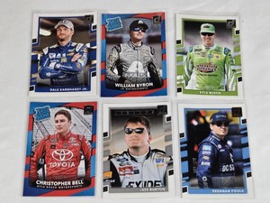 Lot of 6 Racing Cards Featuring Dale Earnhardt Jr., William Byron, Kyle Busch, Christopher Bell, Jeff Burton, and Brennan Poole. Includes Rated Rookie cards and Legends series