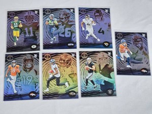 Lot of 7 Football Panini Illusions Rookie Cards Featuring Jayden Reed, Zach Charbonnet, Marvin Mims, Zay Flowers, Tank Bigsby, Aidan O��Connell, and Jaleel McLaughlin