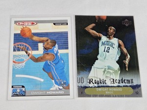Lot of 2 Dwight Howard Rookie Basketball Cards including Topps Total and Upper Deck Rookie Academy.