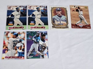 Lot of Ken Griffey Jr. Baseball Cards including Stadium Club and Fleer with special features such as HR Club, Allen & Ginter, and National Baseball Card Day editions.