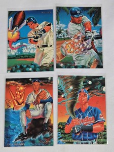 Lot of 4 Baseball Cards Featuring Jeff Bagwell, Raul Mondesi, Greg Maddux, and Manny Ramirez with 1994 Fleer Brand Illustrations by Wayne Anthony Still.
