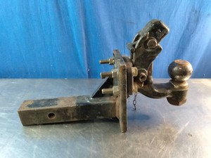 Heavy-duty combination pintle hook and trailer ball hitch mounted on a receiver shank with 2 516 Ball
