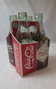 Vintage 4 Pack Retro Coca Cola Bottles With Carrier - Bottles are empty- These are limited edition bottles