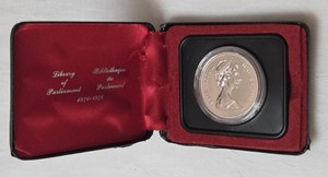 1876-1976 Canadian Silver Dollar featuring the profile of Queen Elizabeth in Black Case