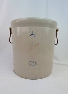 Red Wing 4-gallon stoneware crock with the Red Wing Potteries, Inc. maker's mark. The crock has