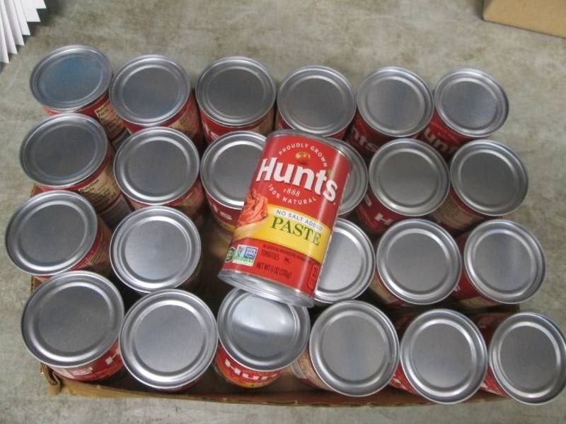 24 6 Oz cans of Hunts tomato paste